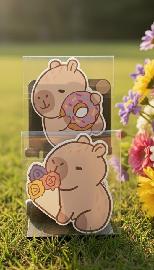 Two cartoon bear stickers in a clear stand on a gray background